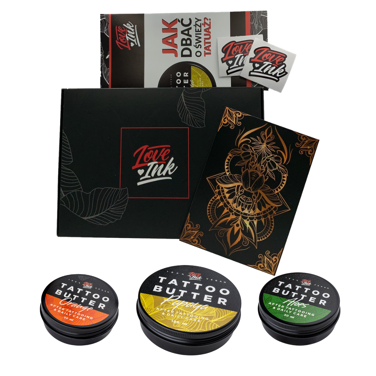 A collection of Love Ink tattoo care products displayed on a transparent background. The items include a black box with the Love Ink logo, a brochure on how to care for a new tattoo, a sticker, a black and gold tattoo design, and three tins of Tattoo Butter in different formulations for daily care.