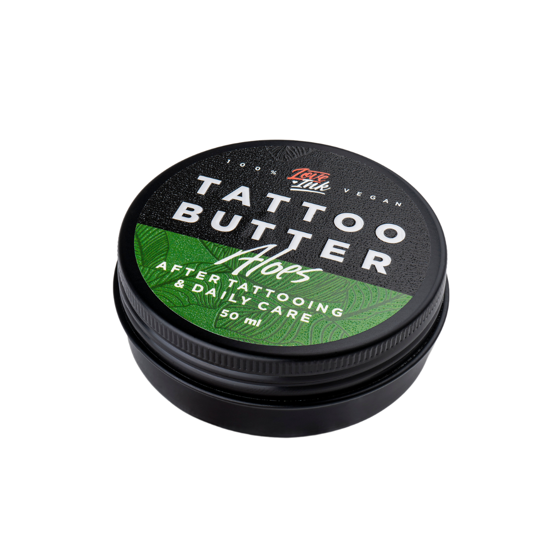 Packshot of Love Ink Tattoo Butter Aloe tin, slightly angled, labeled for after tattooing and daily care, 50 ml.